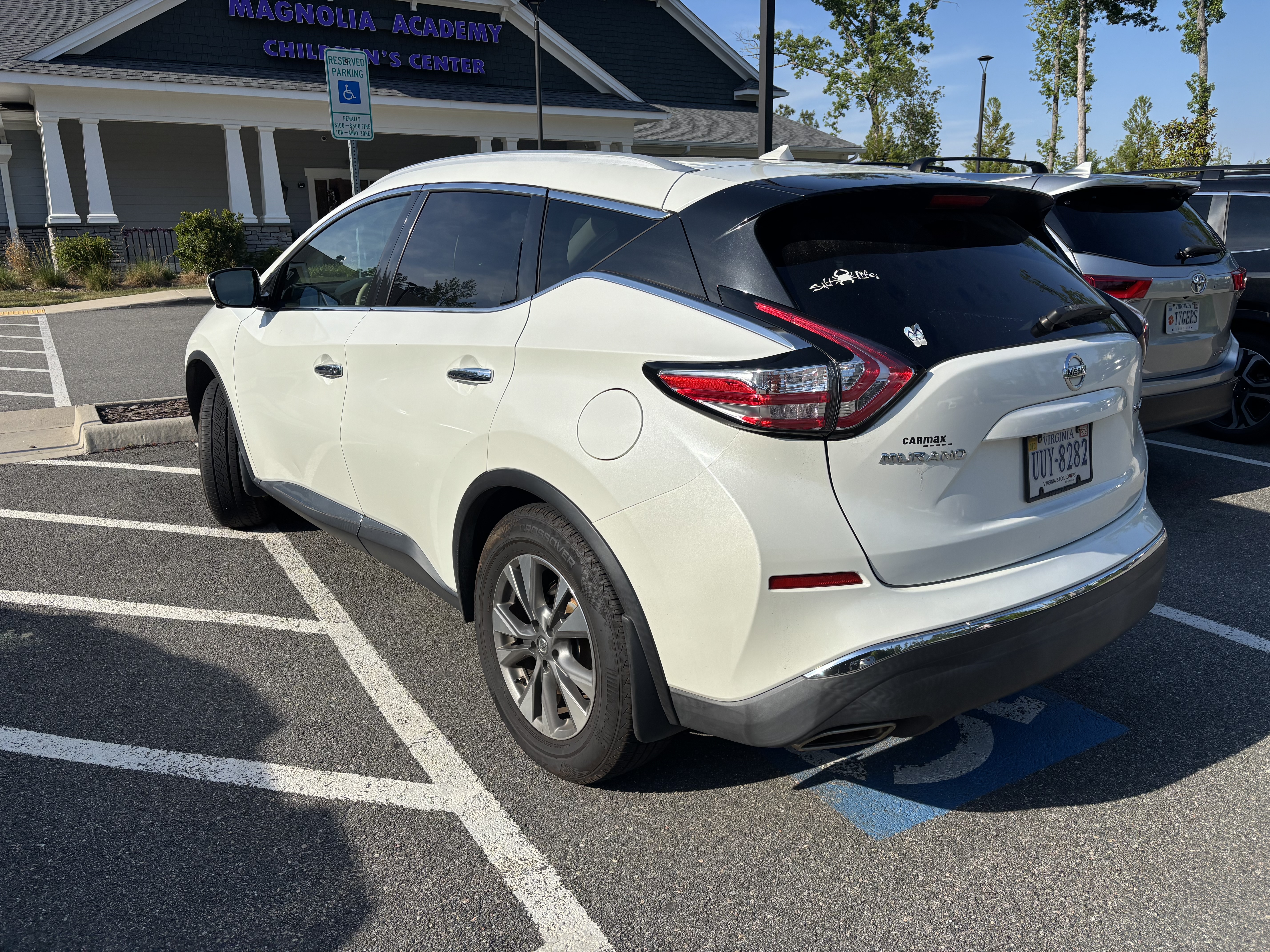 Vehicle illegally parked in handicap spot at Magnolia Academy Children's Center, Moseley VA — May 20, 2026 (photo 1 of 2)